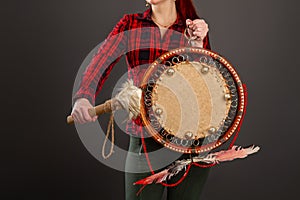 Girl playing the tambourine