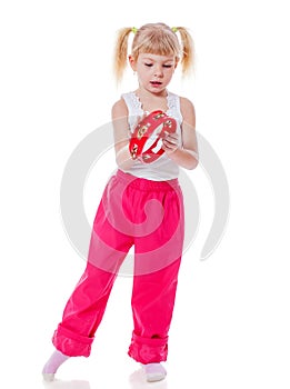 Girl playing tambourine