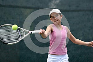 Girl playing tennis img