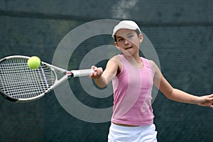 Girl playing tennis