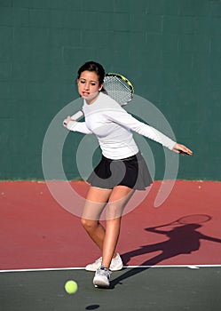 Girl playing tennis