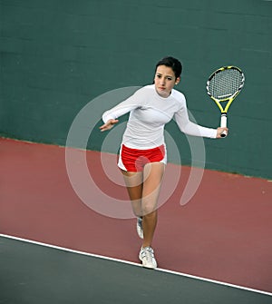 Girl playing tennis