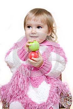 Girl playing with two balls