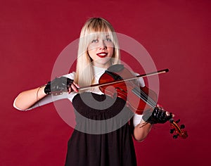 Girl playing the violin portrait