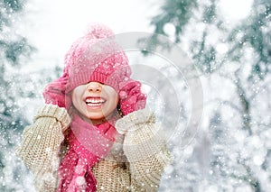 Girl playing on a winter walk