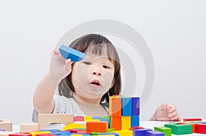 Girl playing wood blocks