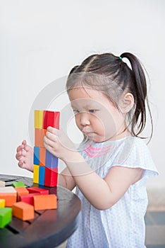 Girl playing wood blocks