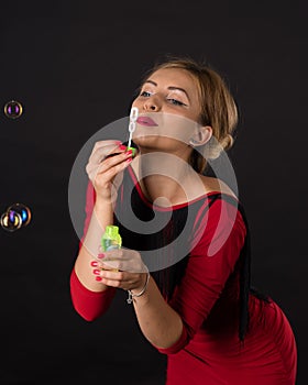 Girl Playng With Soap Bubbles