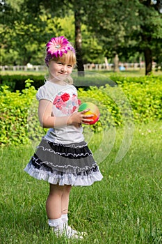 Girl plays with ball