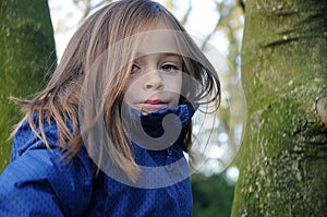 Girl plays outside in a park