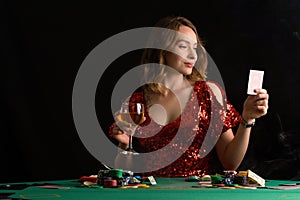 Girl plays poker. Casino and card games, money and success