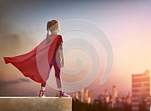 Girl plays superhero photo