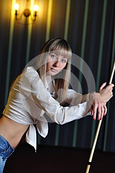 Girl with a pool cue
