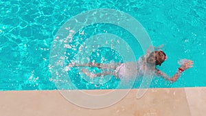 Girl In The Pool Learning To Swim