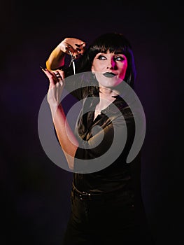 Girl posing with colored light