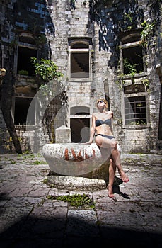Girl posing in a fortress Mamula