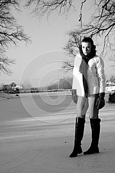 Girl posing on frozen lake