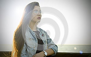 Girl posing in sunlight