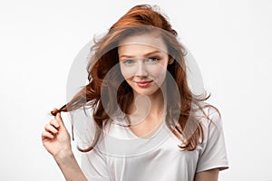 Girl Posing Touching Healthy Red Hair Posing Over White Background