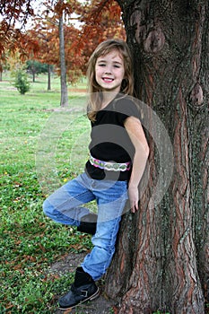 Girl Posing by Tree