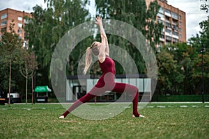 Girl practice yoga and meditation in the city.