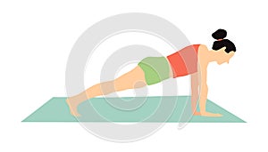 Girl practicing yoga. Pose plank of Chaturanga dandasana.