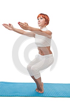 Girl practicing yogatic asana