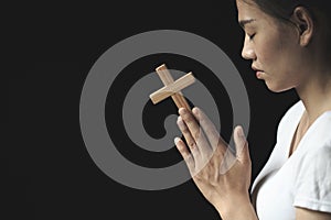 Girl praying to god Both hands clasped the cross. Ideas for Christ. Christianity. Catholic religion. sacred. Heaven. Pray. Believe