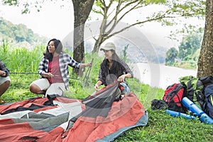 Girl prepare tent nature tourism concept