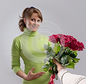 Girl presented with a bouquet of flowers