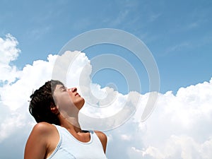 Girl profile on blue sky