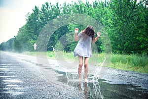 Girl in a puddle