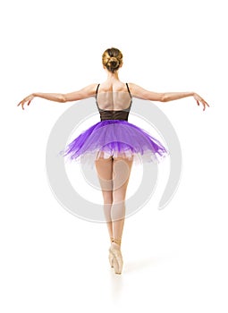 Girl in purple tutu and black leotard dance ballet