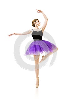 Girl in purple tutu and black leotard dance ballet