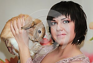 Girl and pygmy rabbit