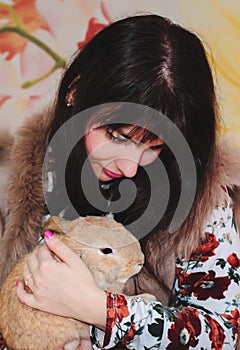 Girl and pygmy rabbit