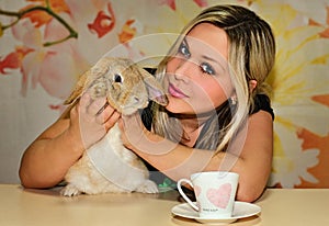 Girl and pygmy rabbit