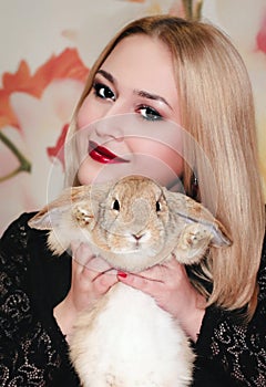 Girl and pygmy rabbit