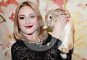 Girl and pygmy rabbit