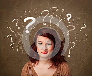 Girl with question mark symbols around her head