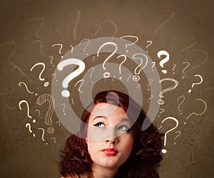 Girl with question mark symbols around her head