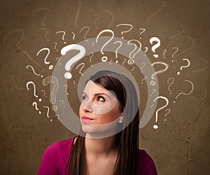 Girl with question mark symbols around her head