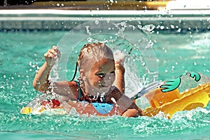 Girl racing in pool