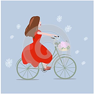 girl on rad dress with bicycle