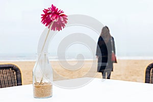 Girl rain sea wind winter portrait woman smile spring coat long hair curly mood shore snow beach cafe flower