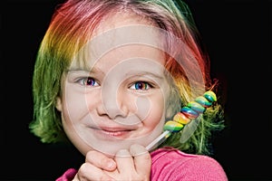 Girl with rainbow lollipop