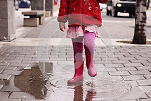 Girl at rainy day in springtime