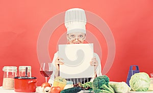 Girl read book best culinary recipes. Culinary school concept. Book by famous chef copy space. Professional level. Woman