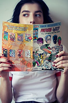 Girl reading comics