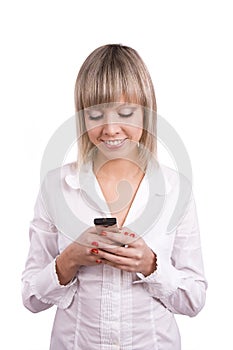 Girl is reading sms on the mobile phone